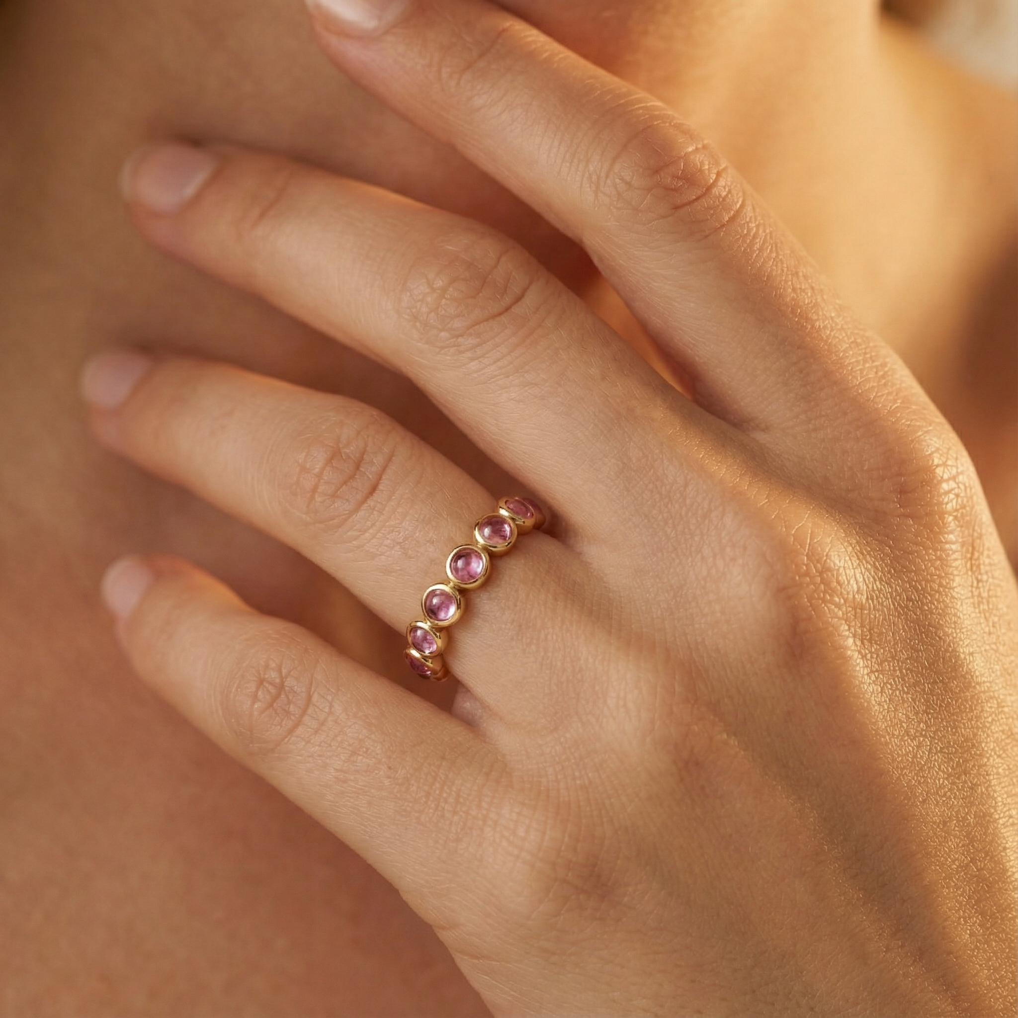 Desert Rose Bezel-Set Pink Tourmaline Cabochon Eternity Band
